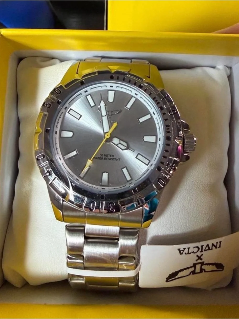 Invicta Silver Stainless Steel Watch with Yellow Accents